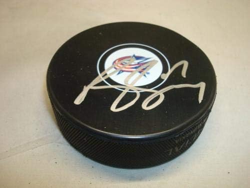 Brandon Dubinsky assinou columbus blue jackets hóquei puck autografado 1a - pucks autografados da NHL